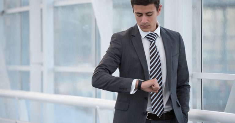 Man looking at his watch